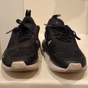 Nike air 270 black and white sneaker . Youth size 4.5 in used condition.
